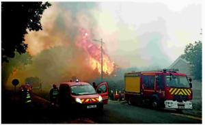 Wildfire forces thousands to flee