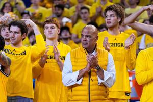 Michigan athletic director Warde Manuel watches senior day celebration after 90-80 win over Michigan State at Crisler Center in Ann Arbor on Sunday, March 8, 2026.