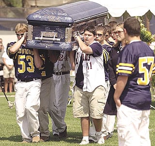 Thousands attend game warden's funeral