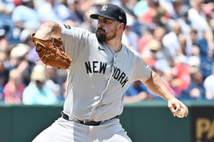 Jun 10, 2026; Cleveland, Ohio, USA; New York Yankees pitcher Carlos Rodon (55) throws a pitch during the first inning against the Cleveland Guardians at Progressive Field. Mandatory Credit: Ken Blaze-Imagn Images