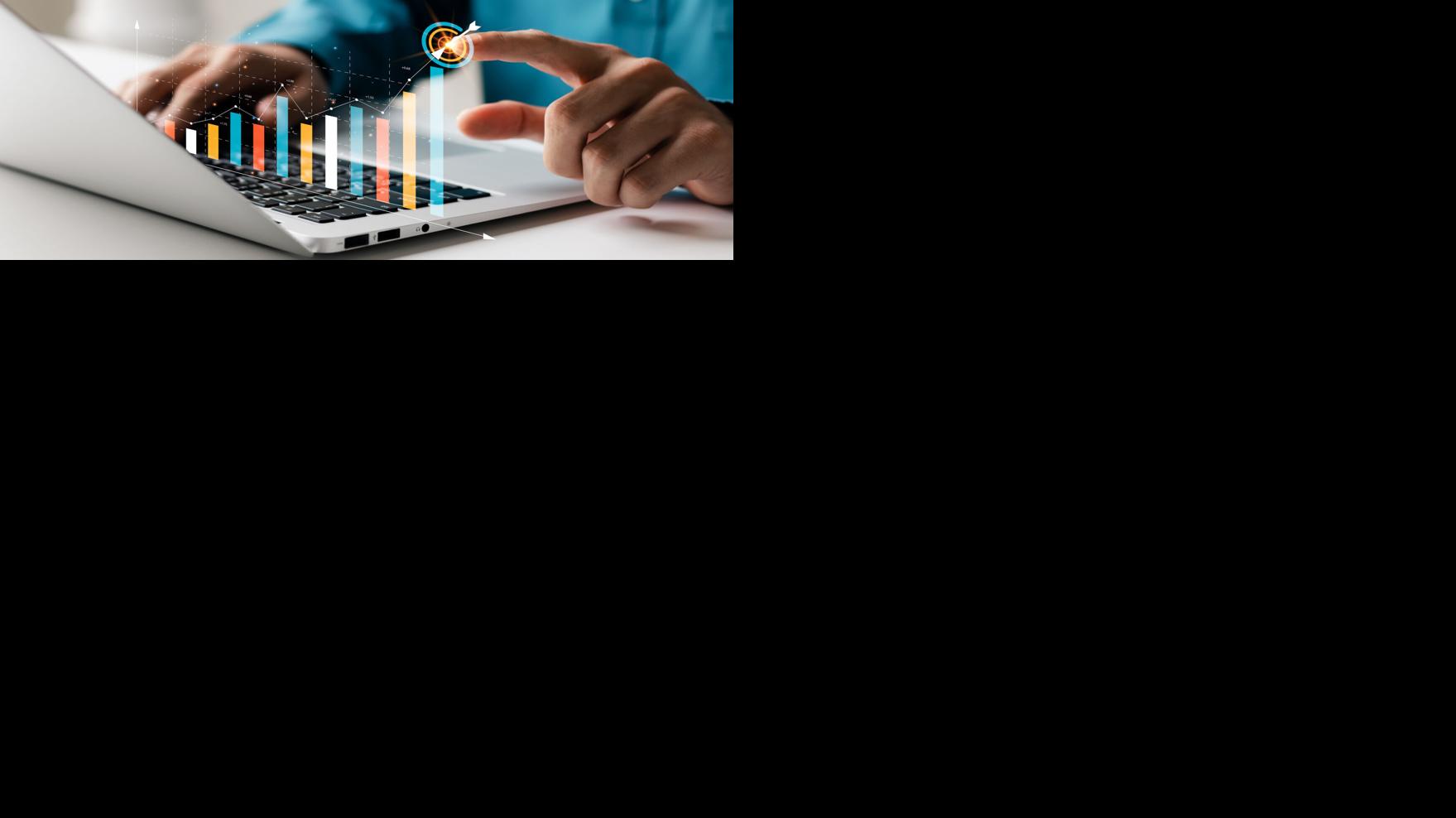 Businessman analyzing company's financial balance sheet working with digital augmented reality graphics. Businessman calculates financial data for long-term investment.