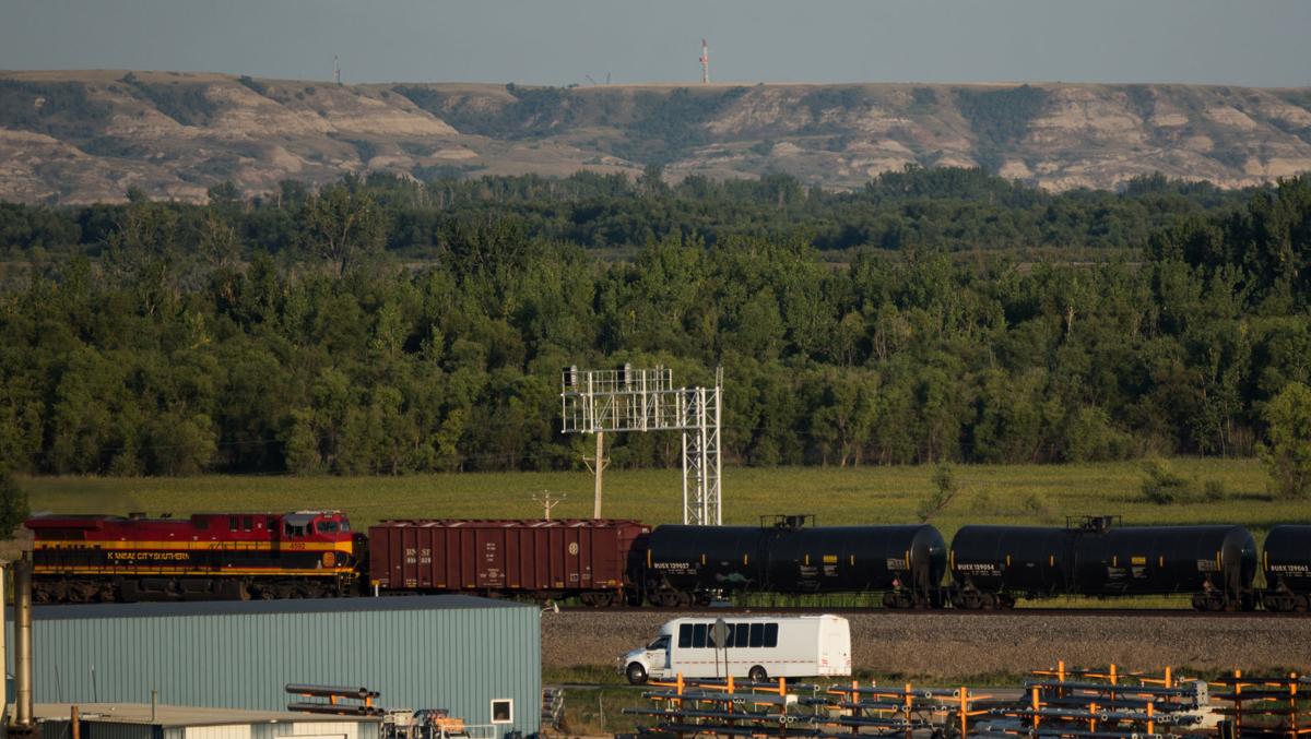 A train takes oil by rail out of Williston