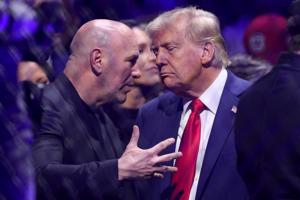 UFC CEO Dana White, left, and then-President-elect Donald Trump talk ringside during UFC 309 at Madison Square Garden in New York on Nov 16, 2024.