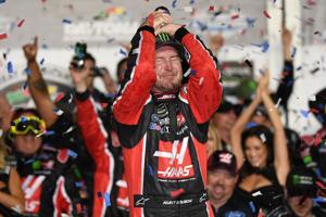 Kurt Busch is emotional after driving his No. 41 Stewart-Haas Racing Ford o victory in NASCARÕs season-opening Daytona 500 at Daytona International Speedway in 2017. He finished second three times, including pushing Team Penske teammate Ryan Newman t