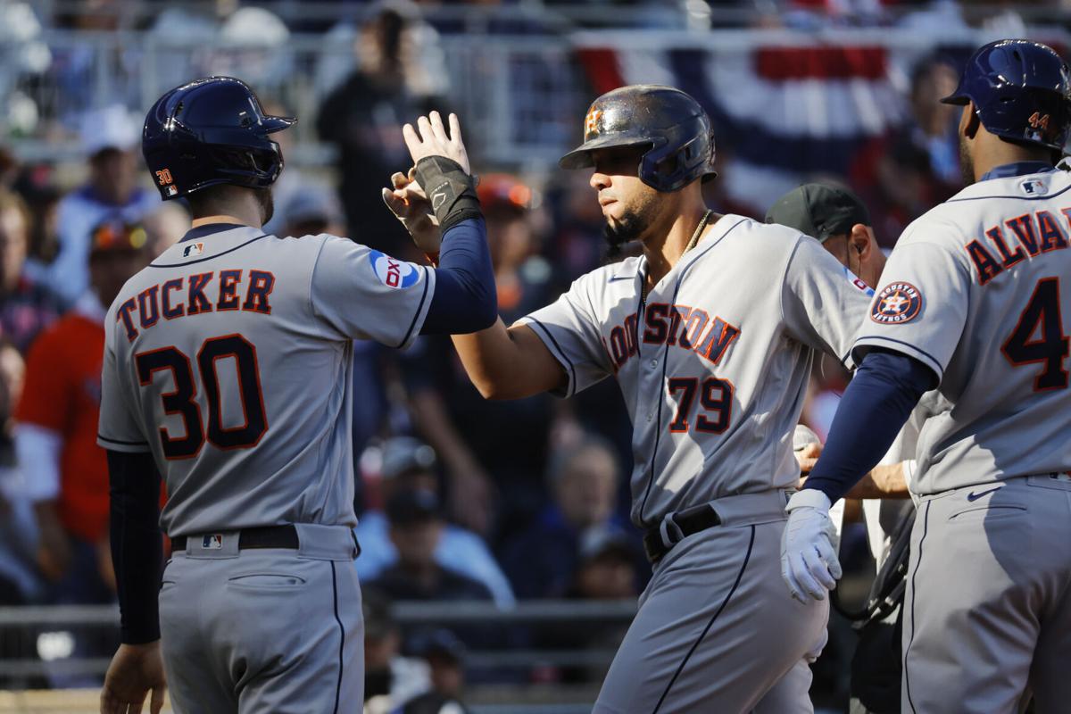 Tucker's 2 HRs, 4 RBIs fall short, Astros lose Series opener