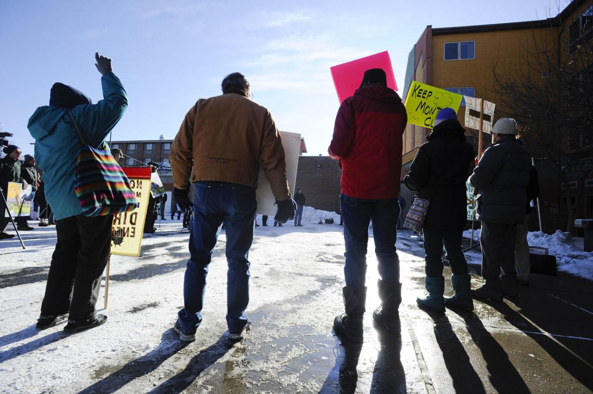 Protestors gather outside the Public Service Commission Monday