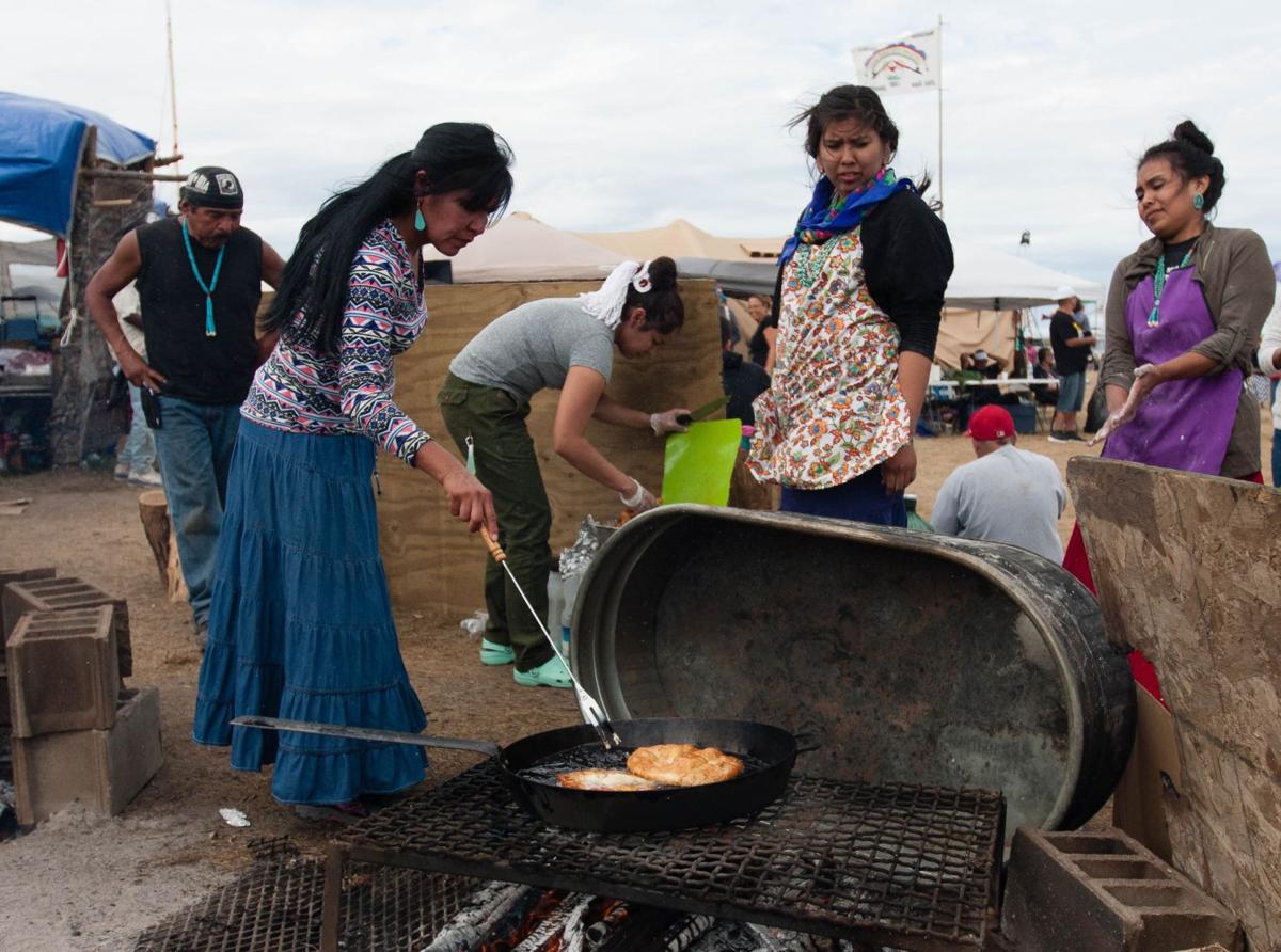 Volunteers cook meals