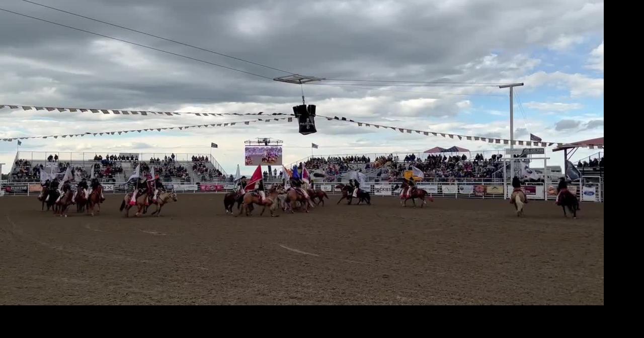 Flag carriers on horseback drill during Red Lodge rodeo Wednesday