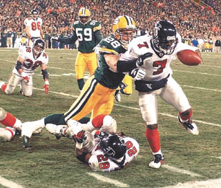 Atlanta Falcons quarterback MIchael Vick warms up before a 27 to