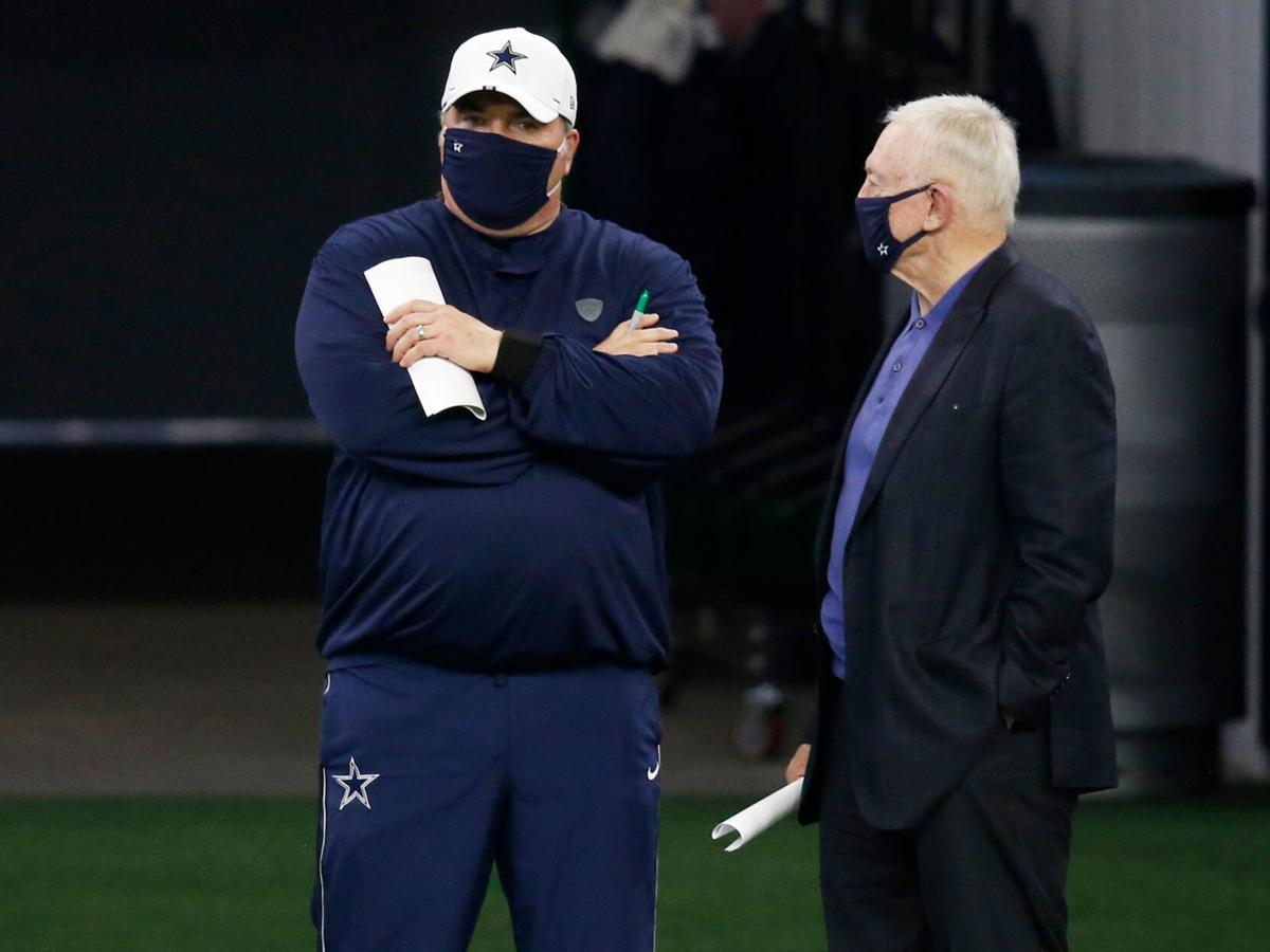 Dallas Cowboys head coach Mike McCarthy talks to Dallas Cowboys owner and general manager Jerry Jones on the sidelines in practice during training camp at the Dallas Cowboys headquarters at The Star in Frisco, Texas on Monday, Aug. 31, 2020.