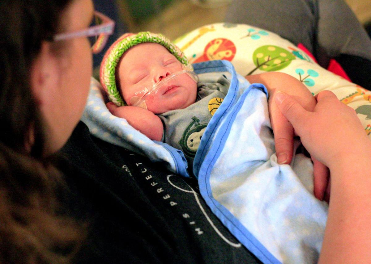 Briona Ferguson of Billings holds her son Eason