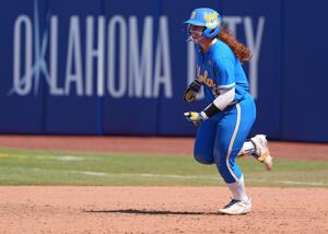 UCLA's Megan Grant (43) runs the bases after a home run in the seventh inning of the Women's College World Series softball game between the Tennessee Volunteers and the UCLA Bruins at Devon Park in Oklahoma City, Sunday, June, 1, 2025.