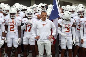 Texas Longhorns coach Steve Sarkisian waits to lead his team onto the field prior to the game against the Mississippi State Bulldogs at Davis Wade Stadium at Scott Field.
