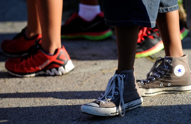 Parents, neighborhood get shoes for 