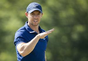 Rory McIlroy hits on the driving range during a practice round for the Memorial Tournament at Muirfield Village Golf Club in