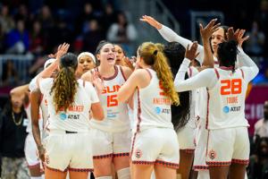 Connecticut Sun center Raegan Beers (15) celebrates with teammates after defeating the Toronto Tempo at Coca-Cola Coliseum.