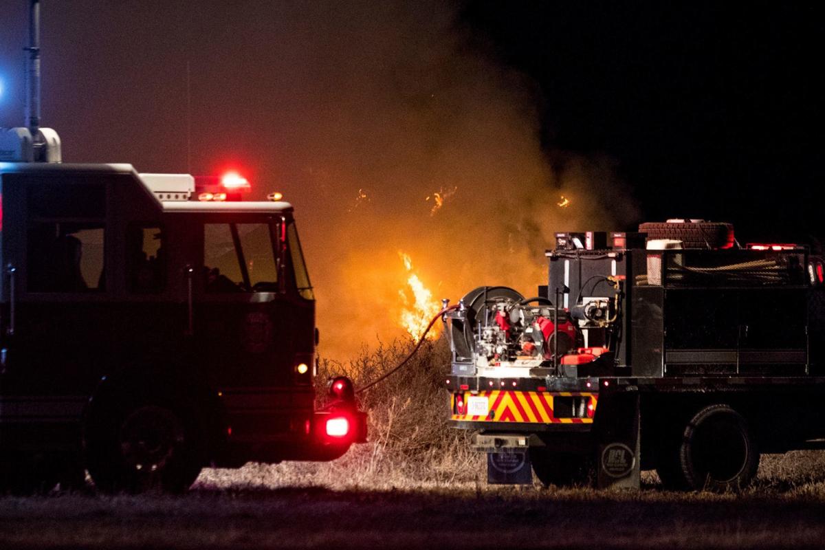 Hay bales, trailer, garage, damaged by fire between Worden and Pompeys