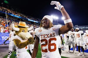 Oct 18, 2025; Lexington, Kentucky, USA; Texas Longhorns linebacker Ty'Anthony Smith (26) celebrates after the game against the Kentucky Wildcats at Kroger Field. Mandatory Credit: Jordan Prather-Imagn Images
