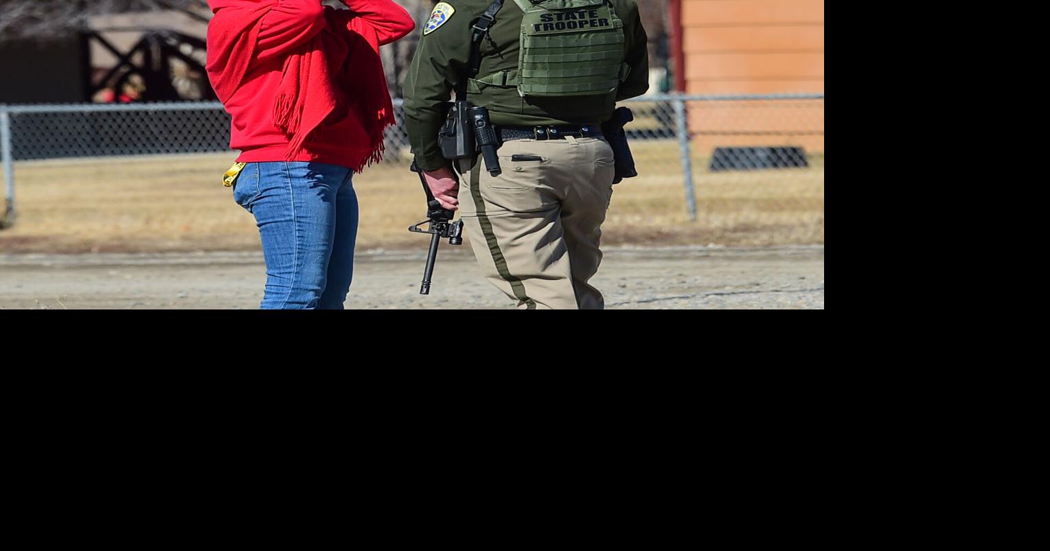 Standoff in the heights continues, officer shot