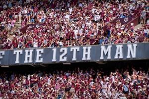 A view of the fans and students and the 12th man logo sign during the game between Texas A&M and New Mexico at Kyle Field on Sept. 18, 2021.