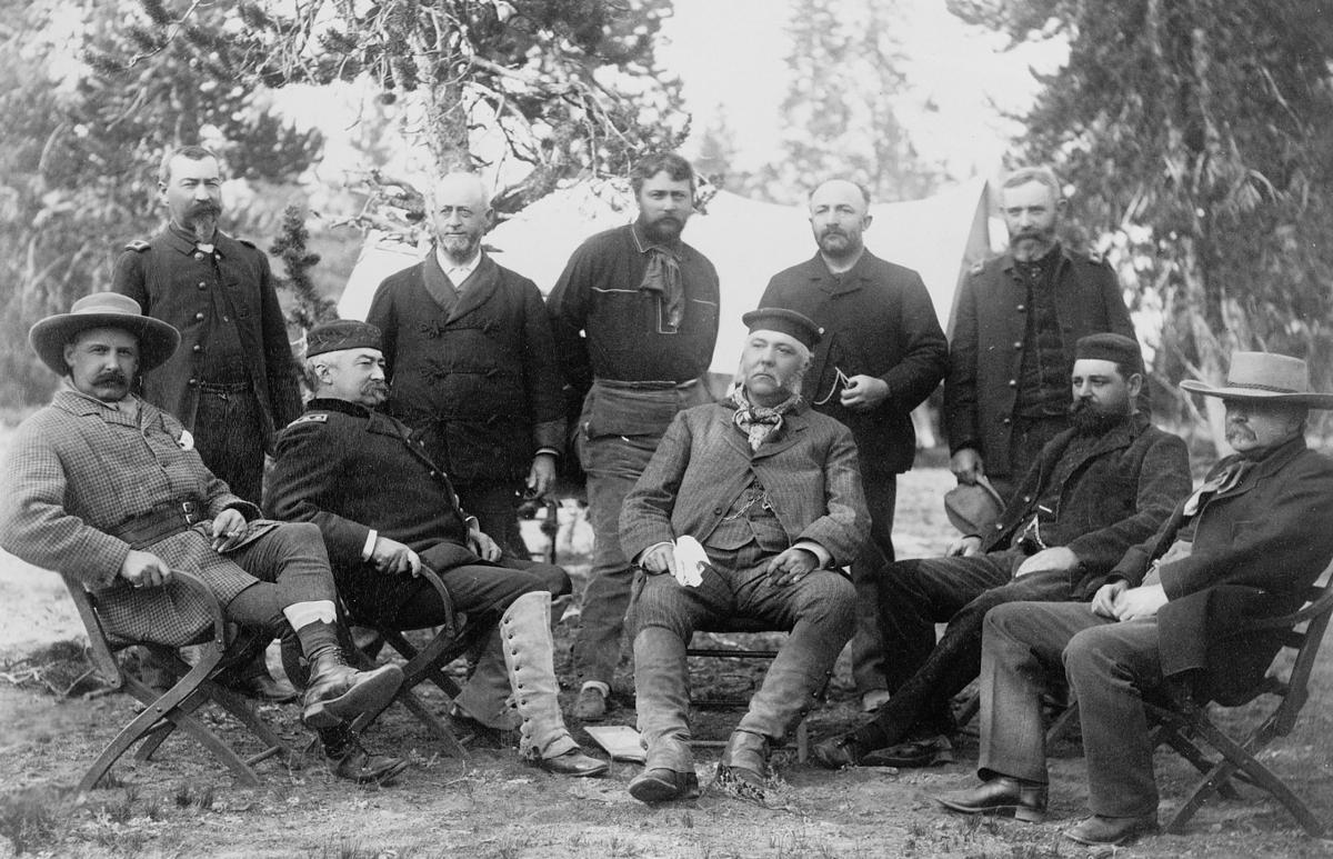 F. Jay Haynes composed this photo of President Chester Arthur, seated in the center, and his guides during an 1883 trip to Yellowstone National Park.