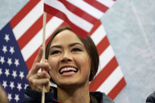 Madison Chock of the United States cheers