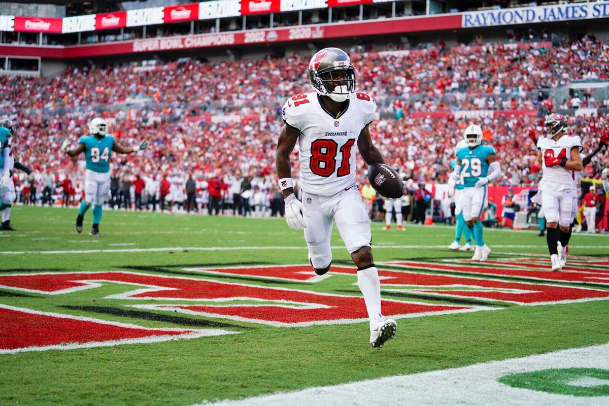 Tampa Bay Buccaneers wide receiver Antonio Brown scores a touchdown in the second quarter during a game against the Miami Dolphins at Raymond James Stadium, Sunday, Oct. 10, 2021 in Tampa, Florida.