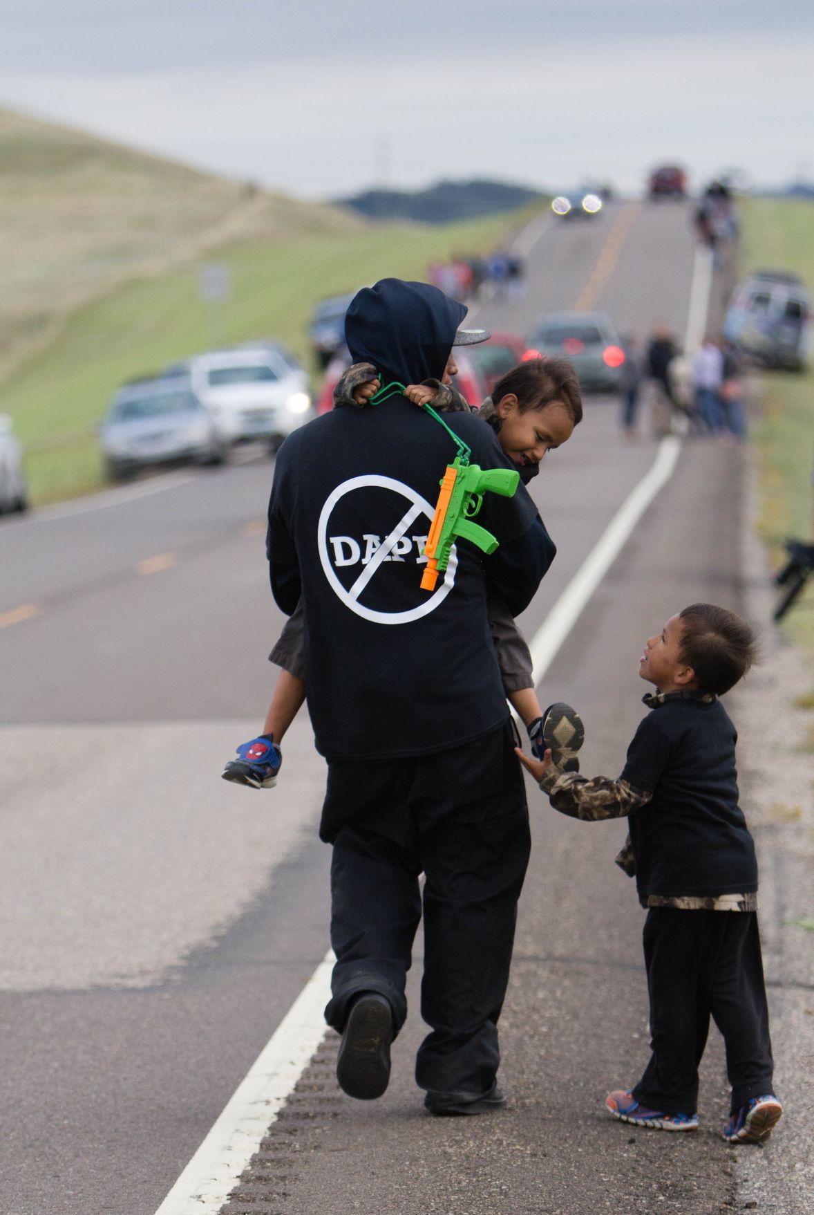 Families bring their children to march