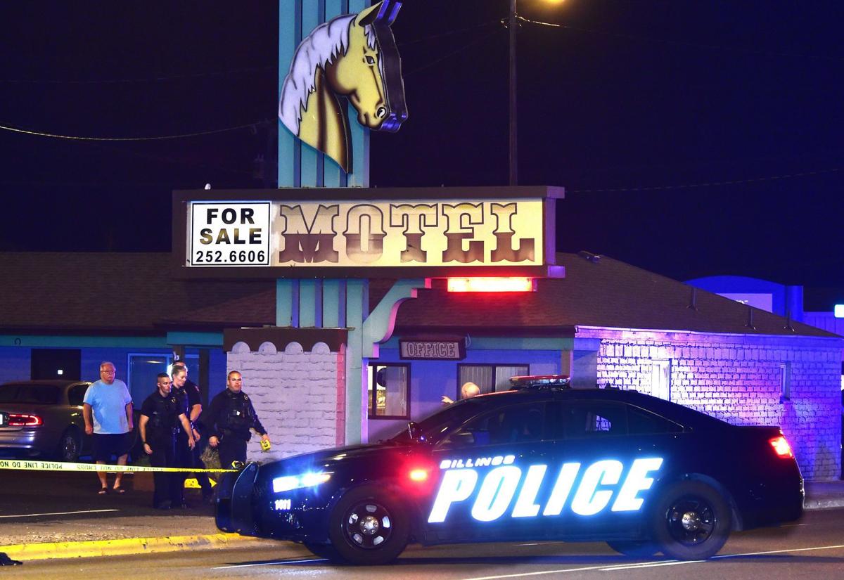 Shooting motel sign