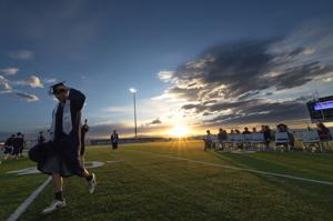 'You conquered': East Helena HS seniors graduate under setting sun, with new chapter ahead