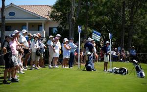 Spectators gather around the 9th green. The first round of the 2026 Senior PGA Championship was held Thursday, April 16, 2026 at The Concession Golf Club in Bradenton, Florida.
