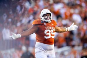 Dec 21, 2024; Austin, Texas, USA; Texas Longhorns defensive lineman Alfred Collins (95) against the Clemson Tigers during the CFP National playoff first round at Darrell K Royal-Texas Memorial Stadium. Mandatory Credit: Mark J. Rebilas-Imagn Images