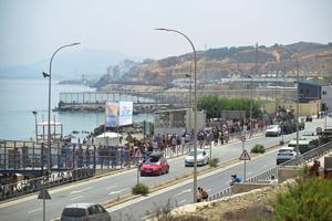 Migrants walk towards the border with Morocco to leave Spain, in Ceuta