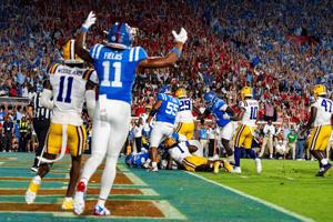 Ole Miss running back Kewan Lacy (5) dives for a touchdown during a college football game between Ole Miss and LSU at Vaught