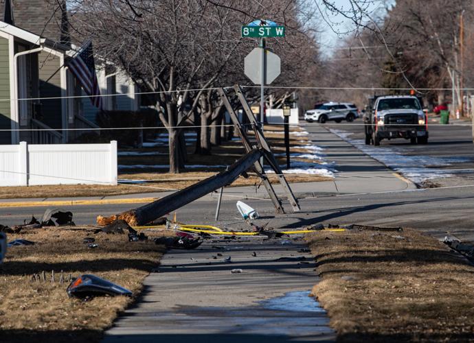Photos Car crash at Avenue F and 8th Street West takes down powerline
