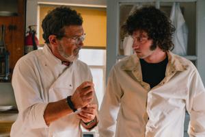Antonio Banderas and Dominic Sessa in A24's Anthony Bourdain biopic "Tony."