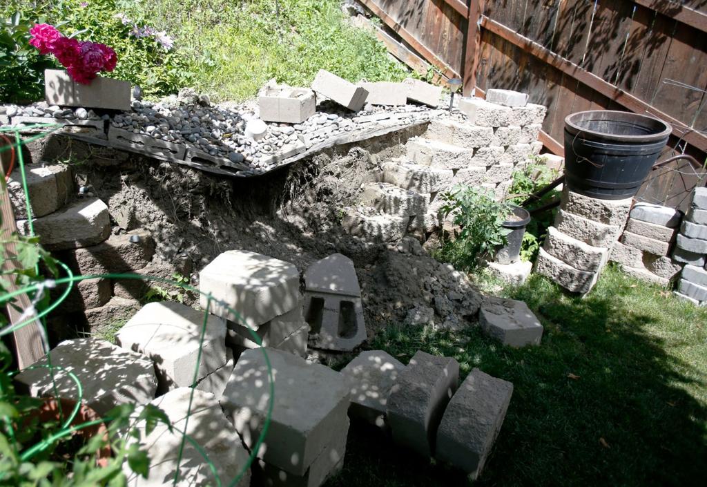 Irrigation Company Drains And Digs Up Ditch Above Water Logged
