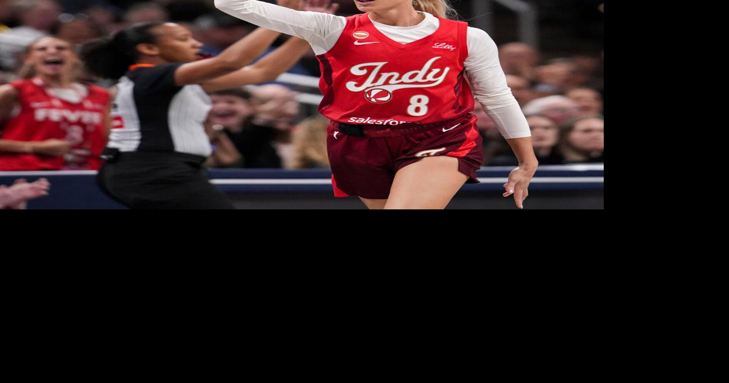 Indiana Fever guard Sophie Cunningham (8) celebrates a 3-pointer Thursday, June 4, 2026, during the first half of a game at Gainbridge Fieldhouse in Indianapolis.