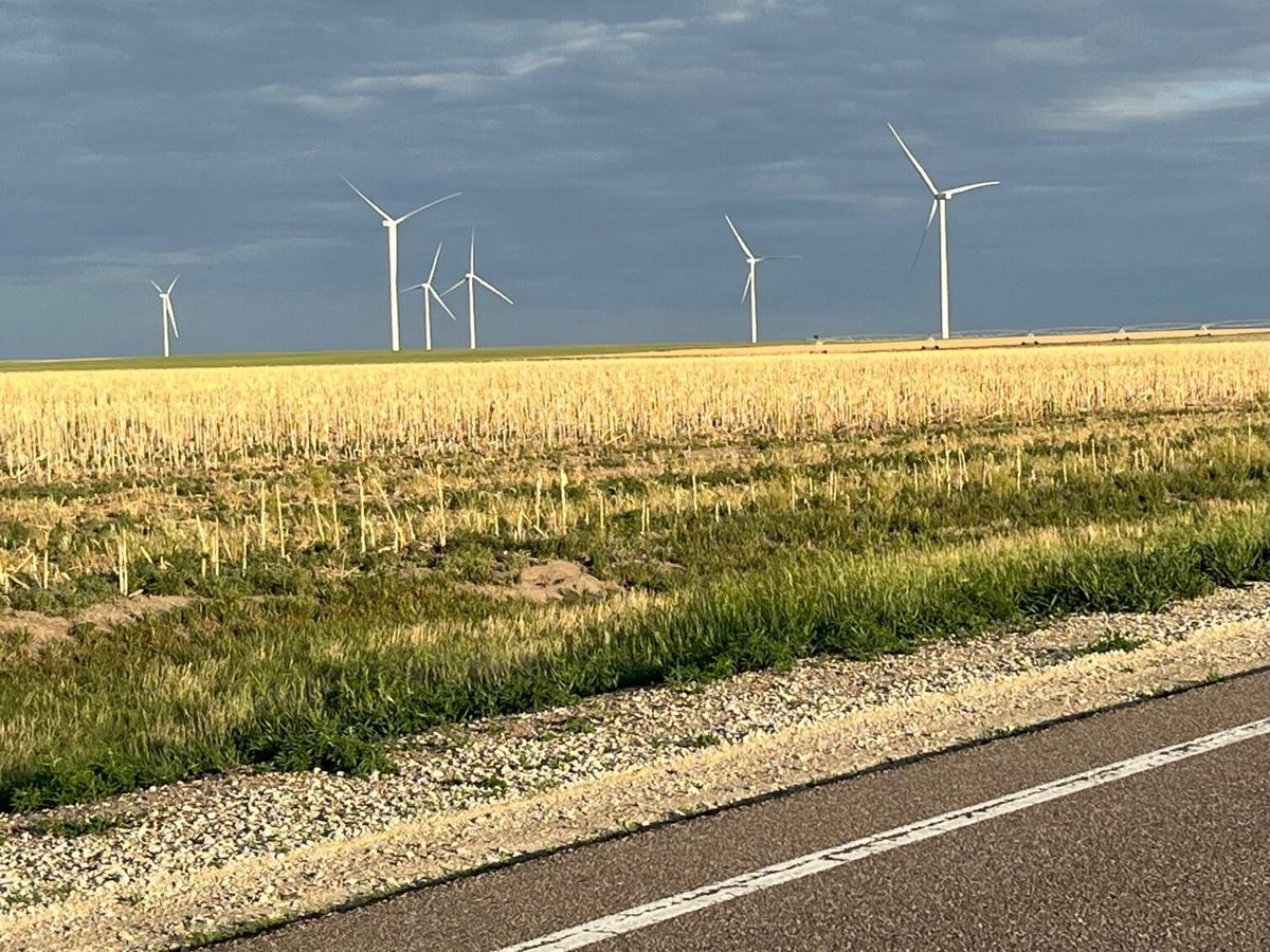 Clouds over a windmill farm outside Oakley, Kansas