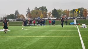 Missoula Hellgate boys soccer players celebrate their 1-0 playoff win over Bozeman Gallatin