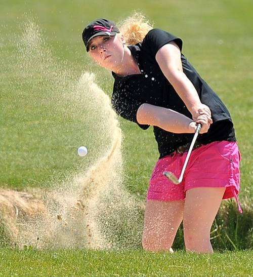 Molly Fedje from Colstrip hits from a fairway bunker Golf
