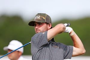 Ryder Cowan makes his tee shot on the No. 9 hole during the second round of the U.S. Open at Shinnecock Hills Golf Club in Southampton, New York on June 19, 2026.