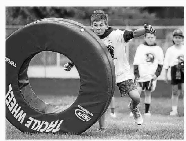 Troy Andersen returns to hometown of Dillon, hosts youth football camp