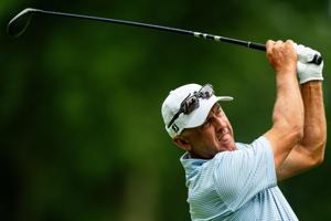 Cameron Percy follows through on his drive off the ninth tee during round 2 of the Kaulig Companies PGA Championship, July 10,