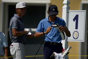 Miles Russell (left) and his caddy Charlie Woods (right) compete in the 2026 U.S. Open qualifier at BallenIsles Country Club