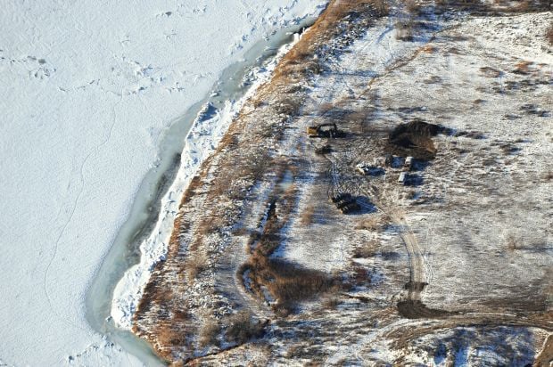 Vehicles at oil spill location
