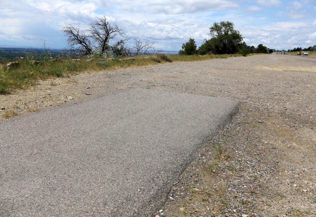 The paved bike trail along the Rimrocks