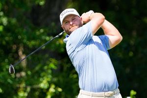 Jordan Smith plays his shot from the 11th tee during the second round of the 2026 Charles Schwab Challenge.