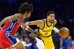 Dec 13, 2024; Philadelphia, Pennsylvania, USA; Indiana Pacers guard Tyrese Haliburton (0) controls the ball against Philadelphia 76ers guard Kelly Oubre Jr. (9) during the first quarter at Wells Fargo Center. Mandatory Credit: Bill Streicher-Imagn Im