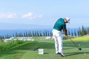 January 4, 2025; Maui, Hawaii, USA; Hideki Matsuyama hits his tee shot on the 18th hole during the third round of The Sentry golf tournament at Plantation Course at Kapalua. Mandatory Credit: Kyle Terada-Imagn Images